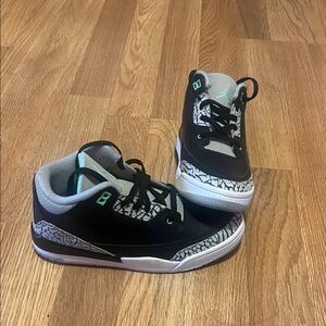 Jordan Kids Black and White Sneakers with Teal Accents